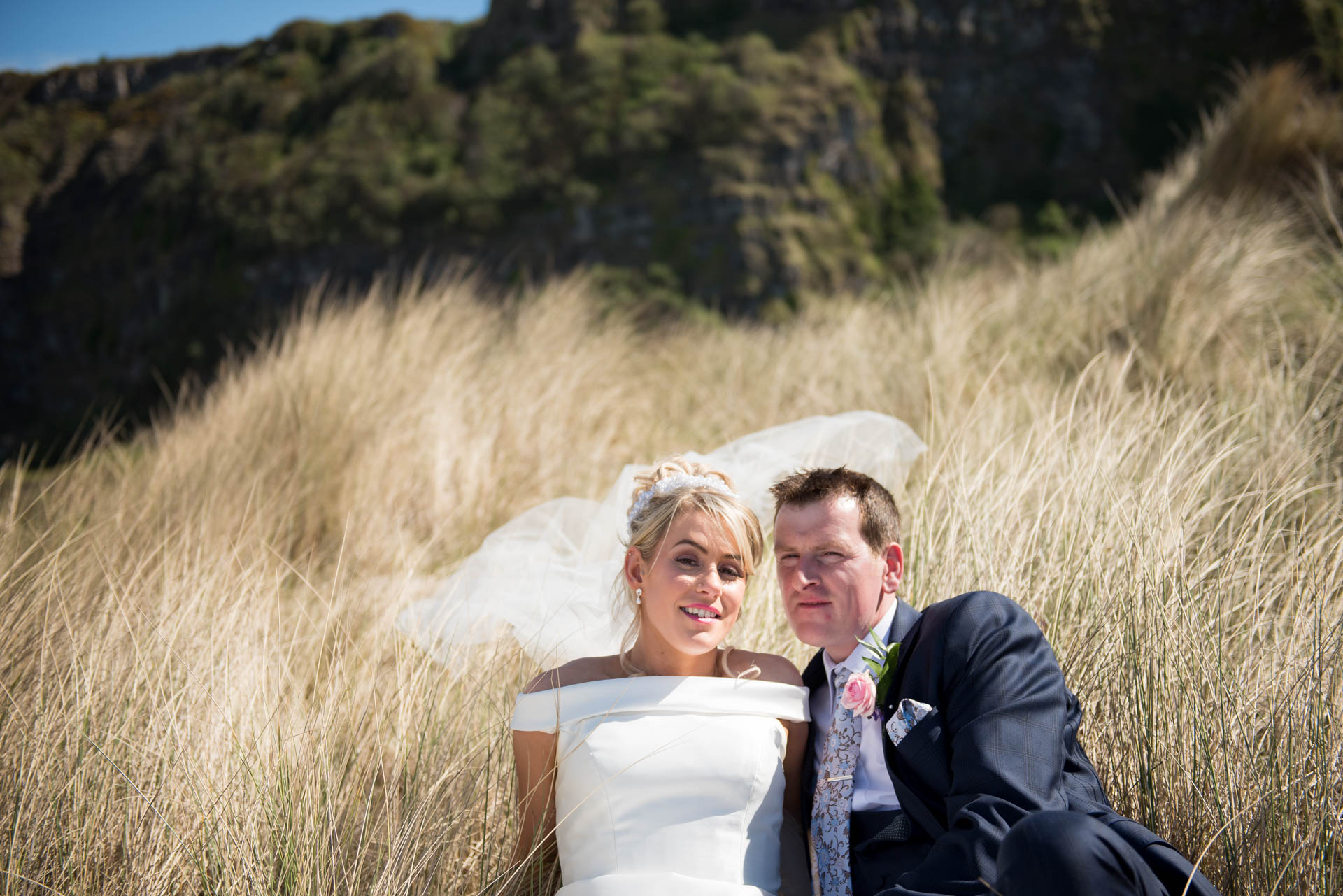 Picture of Noeleen and Cahal at Benone Beach on their wedding day, captured by Fermanagh, Tyrone and Northern Ireland Wedding Photographer, Trevor Lucy Photography